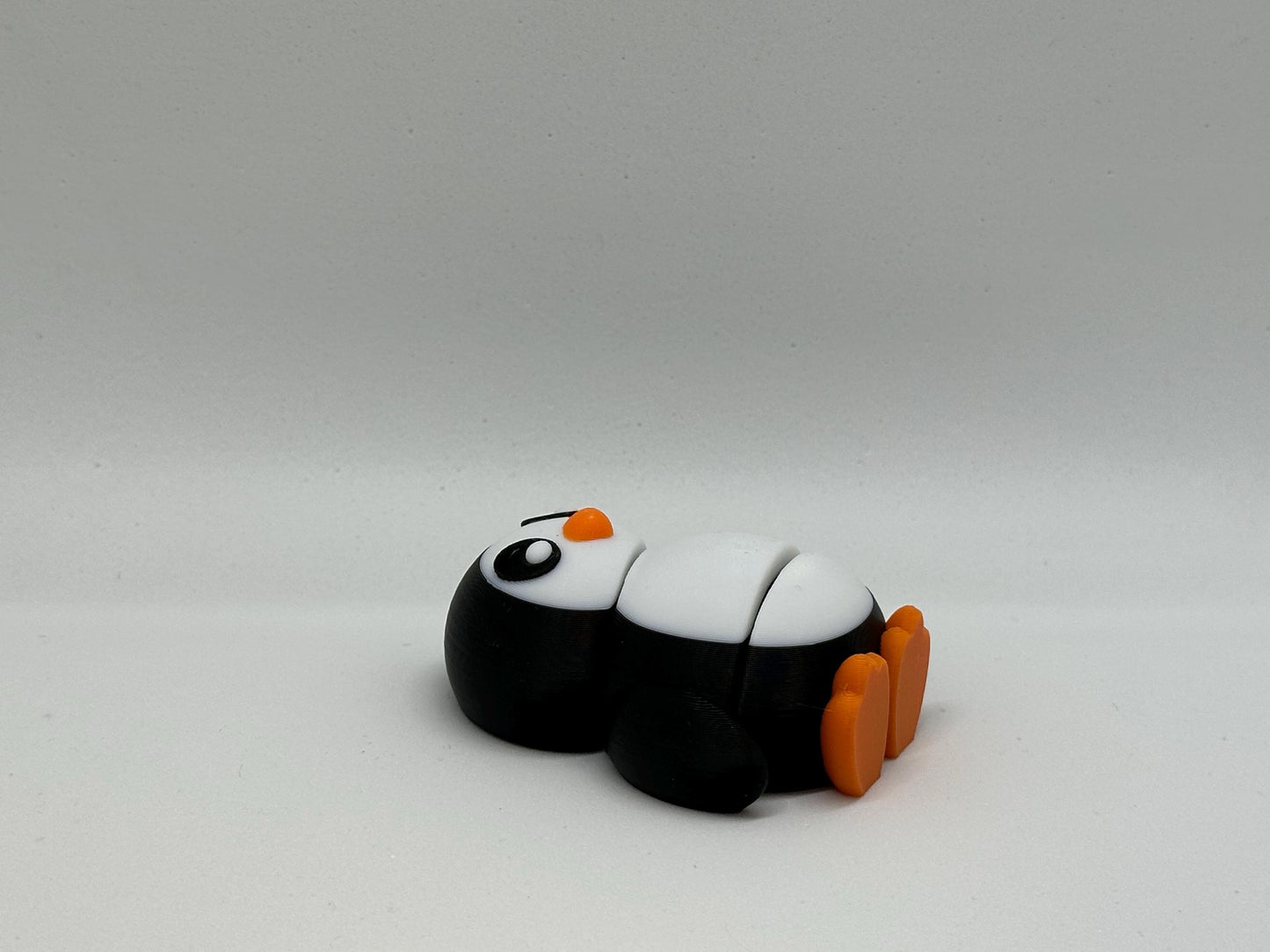 Pinguïn Fleximal - 3D geprint flexibel speeldieren - flexibele dierenfidget
