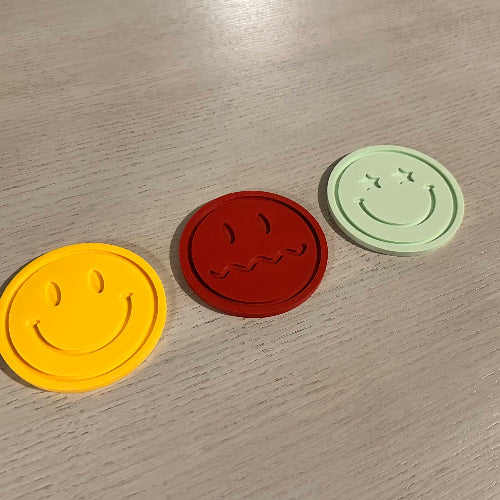 Smiley onderleggers – vrolijke onderleggers set
